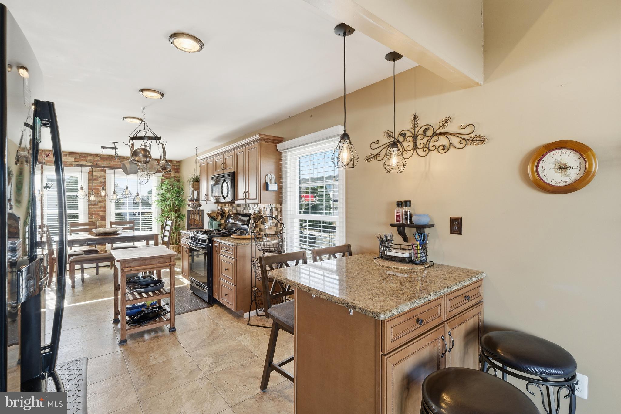 179 Bernard Drive Manahawkin, NJ 08050 - Photo 13 of 35 a view of a dining room with furniture window and outside view