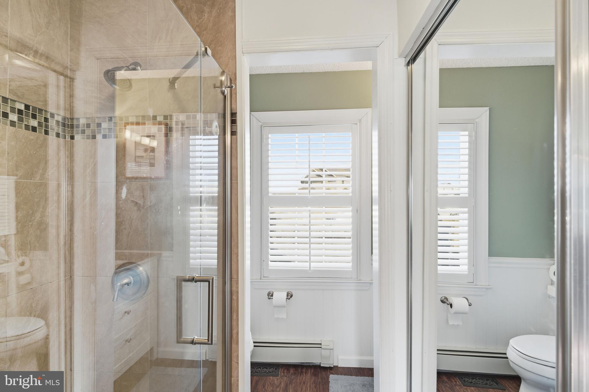 179 Bernard Drive Manahawkin, NJ 08050 - Photo 20 of 35 a bathroom with a shower and a toilet