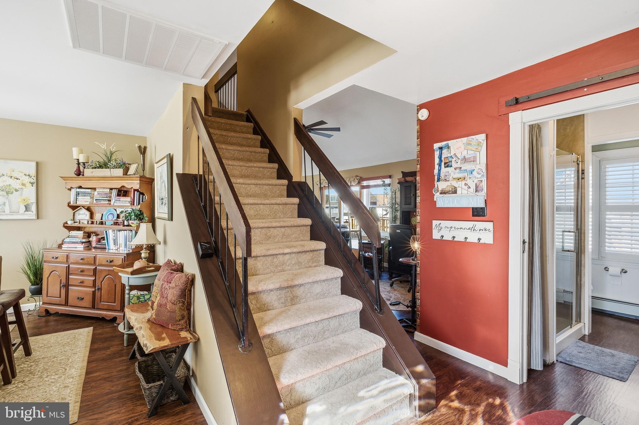 179 Bernard Drive Manahawkin, NJ 08050 - Photo 21 of 35 a view of entryway with furniture and wooden floor