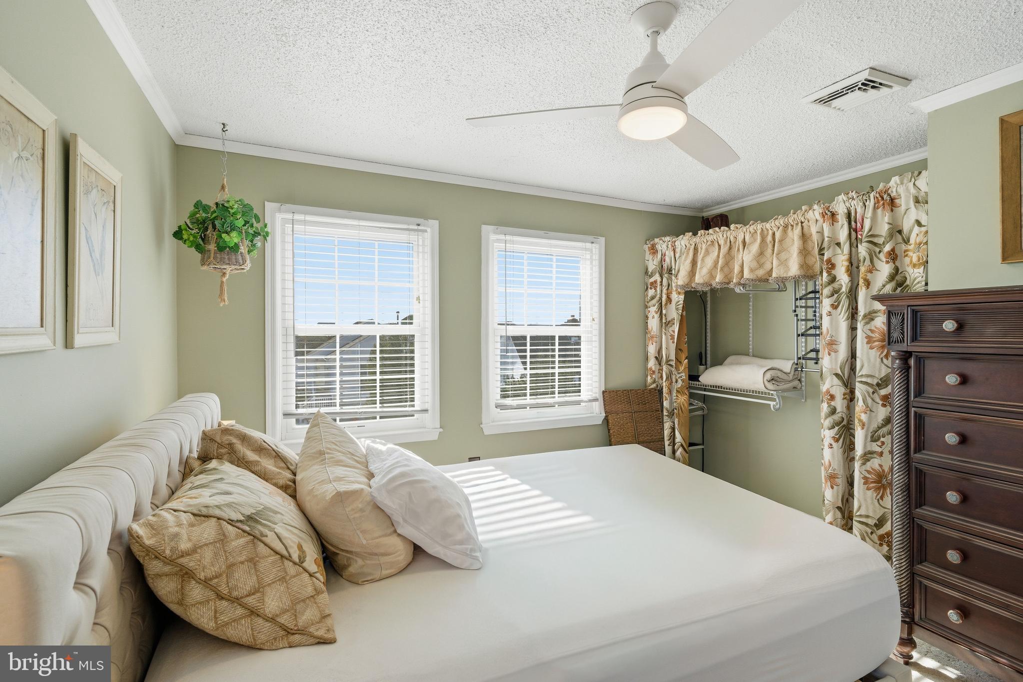 179 Bernard Drive Manahawkin, NJ 08050 - Photo 23 of 35 a bedroom with a bed dresser and a window