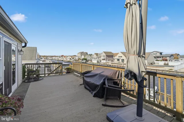a view of a balcony with chairs