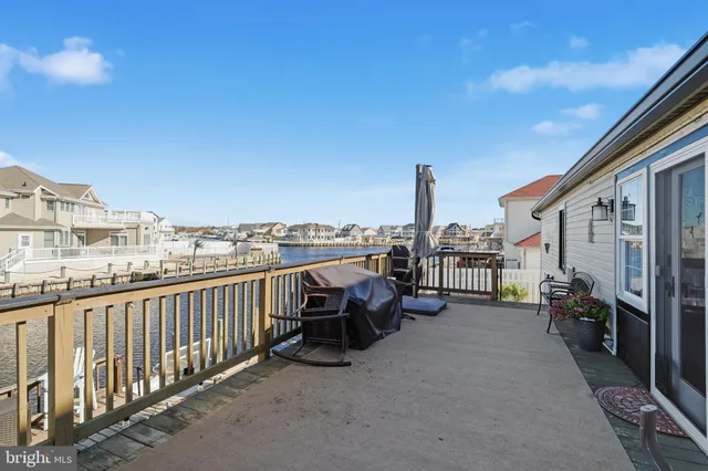 a view of roof deck with patio