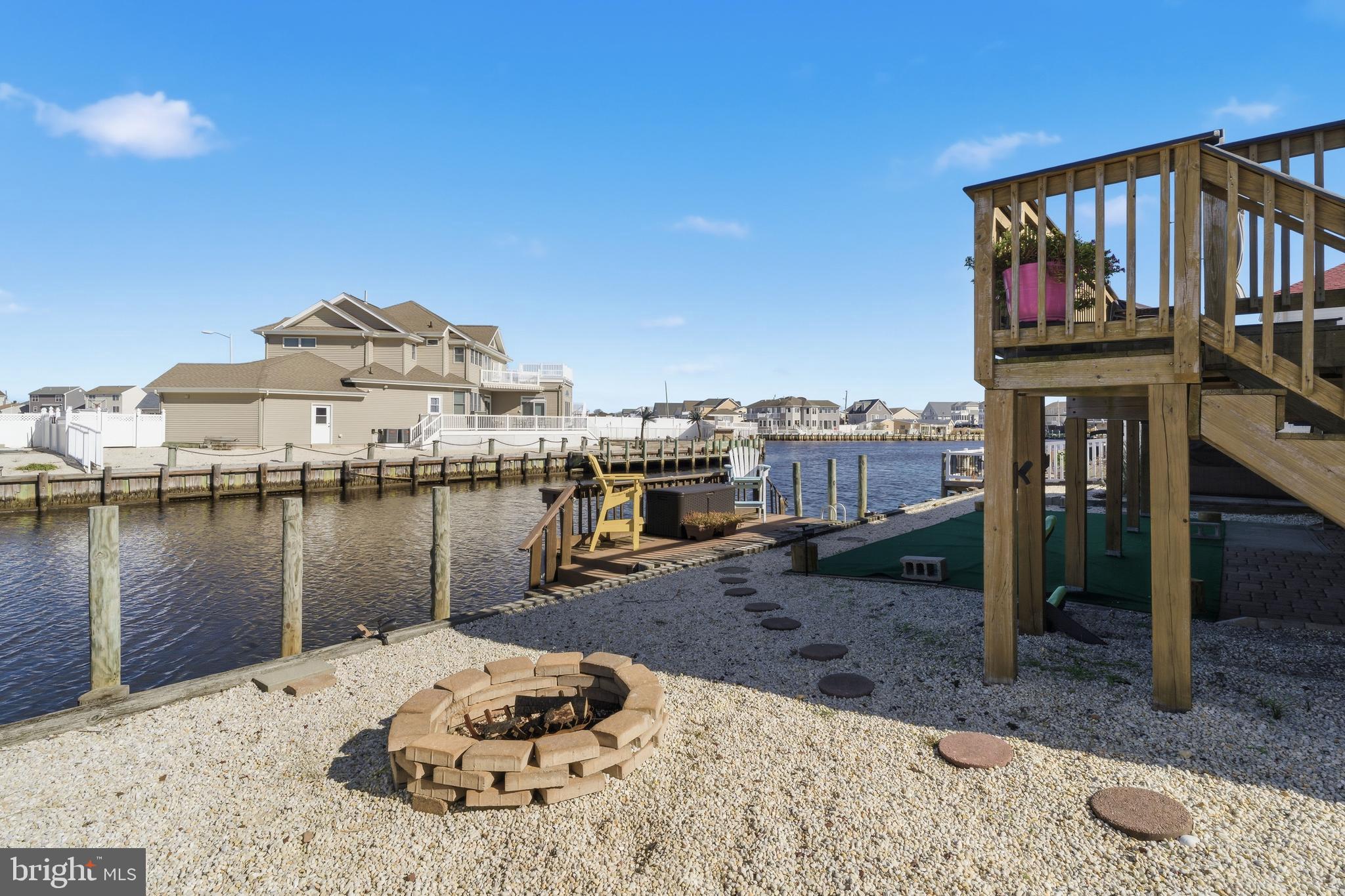 179 Bernard Drive Manahawkin, NJ 08050 - Photo 34 of 35 a view of a lake with a house