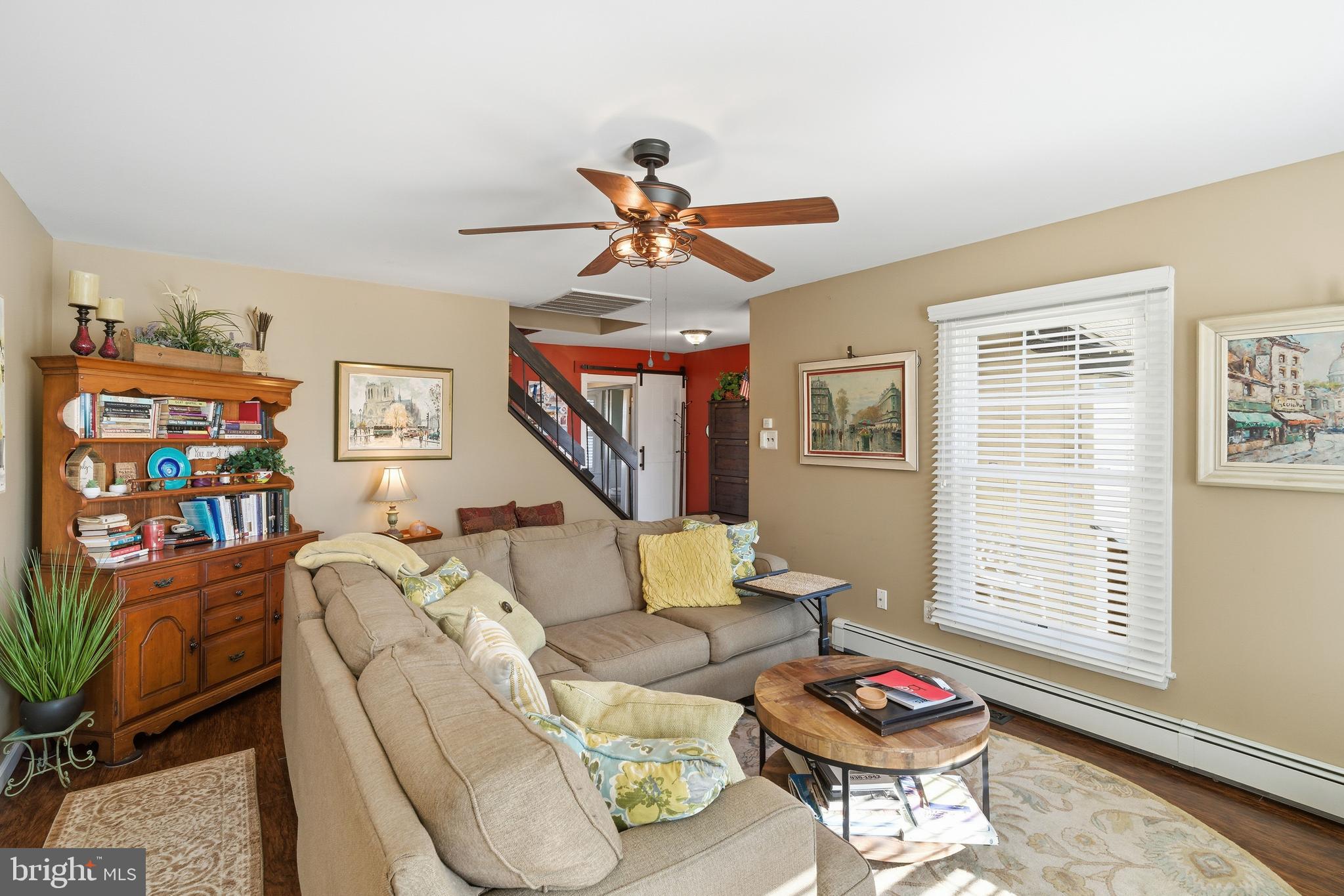 179 Bernard Drive Manahawkin, NJ 08050 - Photo 7 of 35 a living room with furniture and a wooden floor