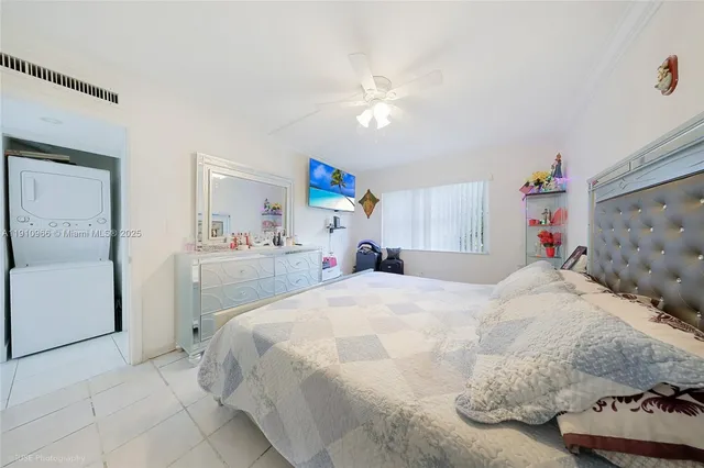 a bed room with a bed and a baby crib