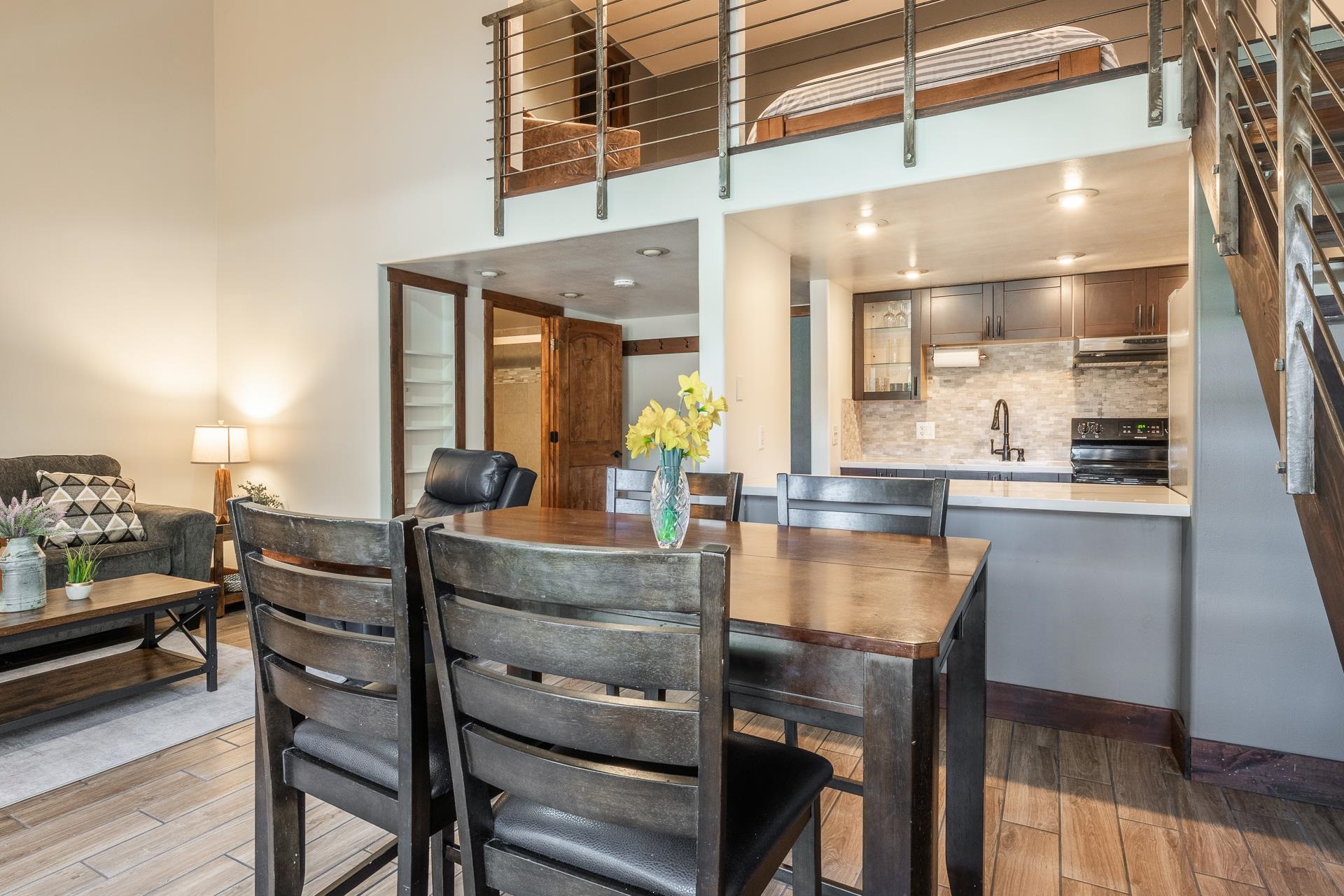 2289 Sierra Nevada Road, Unit F11 Mammoth Lakes, CA 93546 - Photo 5 of 17 a kitchen with a table and chairs