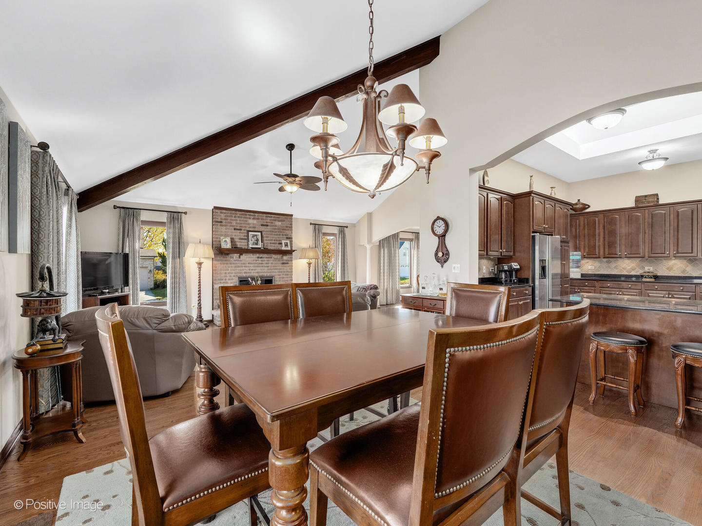 1306 Chauser Lane Woodridge, IL 60517 - Photo 19 of 40 a view of a dining room with furniture window and wooden floor