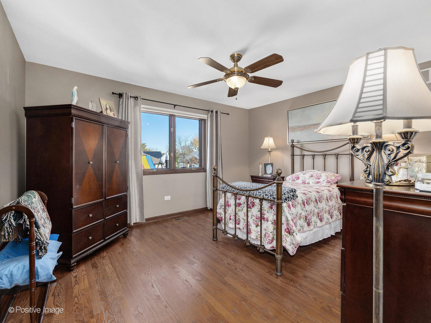 1306 Chauser Lane Woodridge, IL 60517 - Photo 25 of 40 a bedroom with furniture and a window
