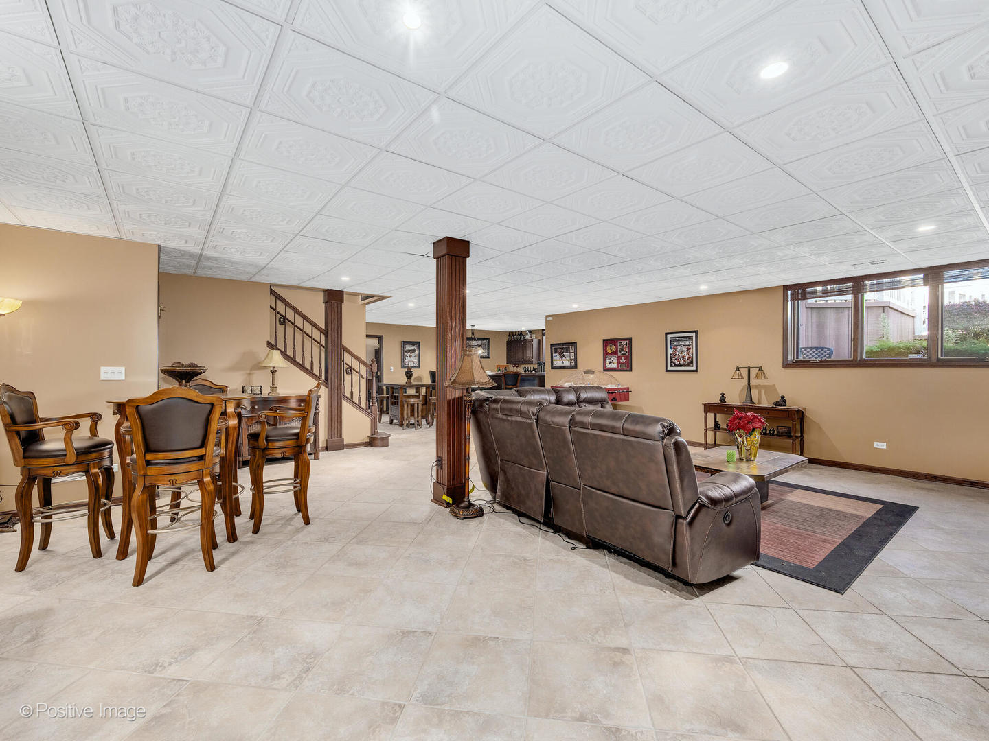 1306 Chauser Lane Woodridge, IL 60517 - Photo 31 of 40 a living room with furniture and a flat screen tv