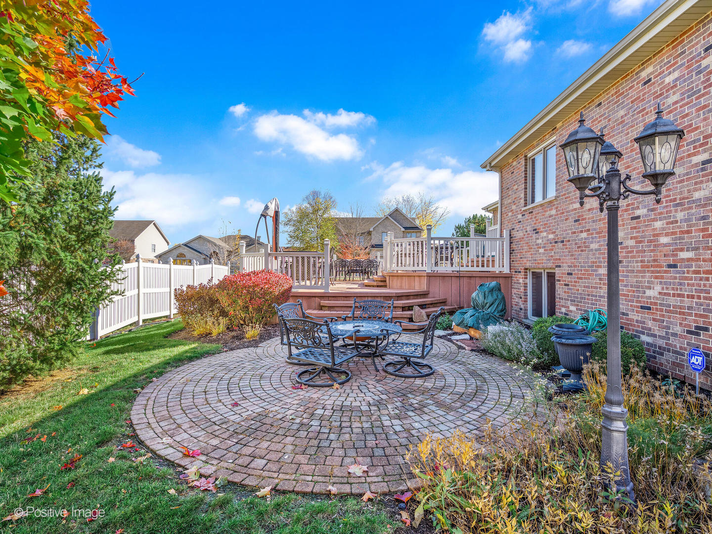 1306 Chauser Lane Woodridge, IL 60517 - Photo 37 of 40 a view of a patio with a table and chairs