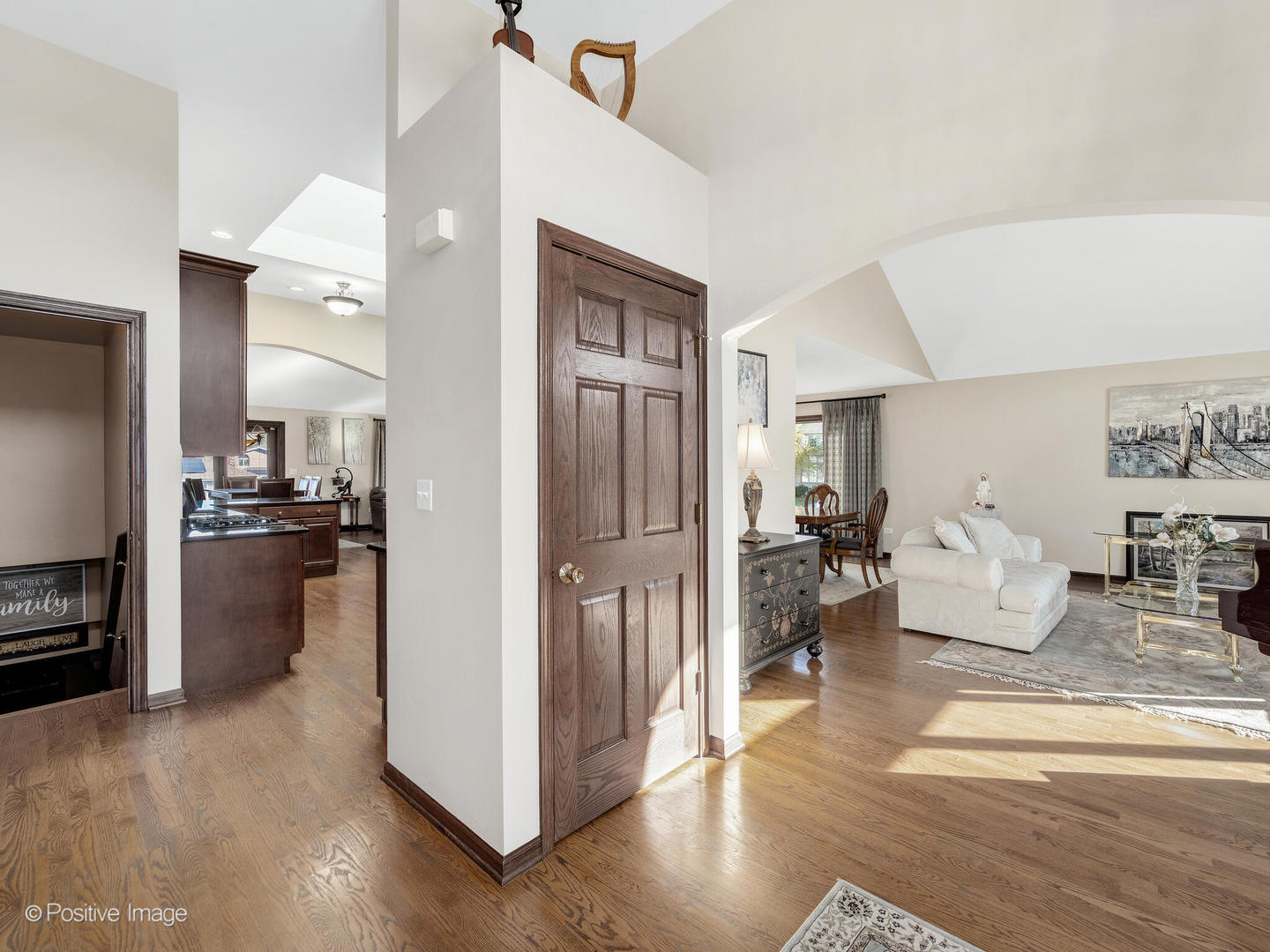 1306 Chauser Lane Woodridge, IL 60517 - Photo 4 of 40 a living room with furniture and a wooden floor