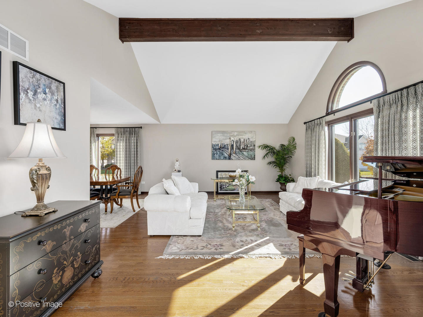 1306 Chauser Lane Woodridge, IL 60517 - Photo 5 of 40 a living room with furniture a fireplace and a large window