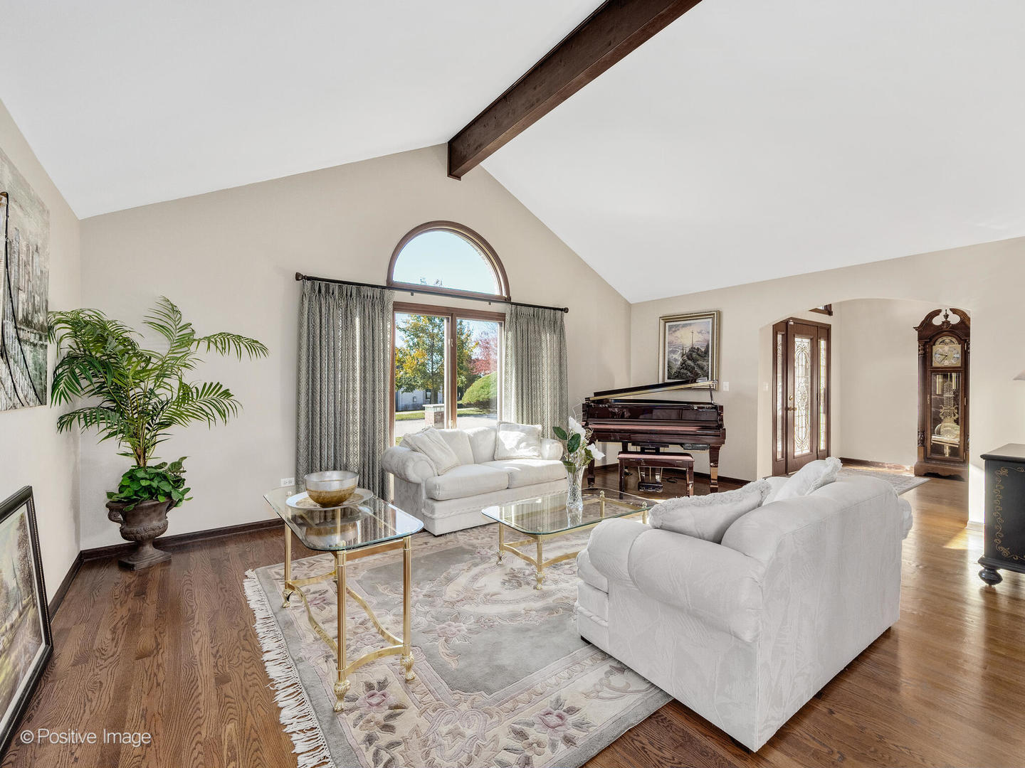 1306 Chauser Lane Woodridge, IL 60517 - Photo 6 of 40 a living room with furniture and a large window