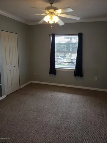 a bathroom with a bathtub and window