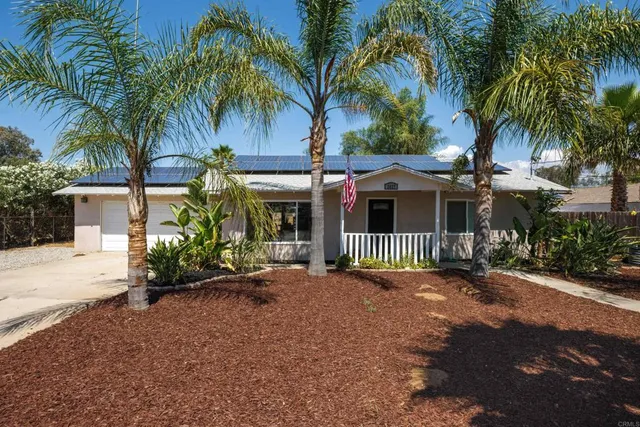 a view of a house with a patio