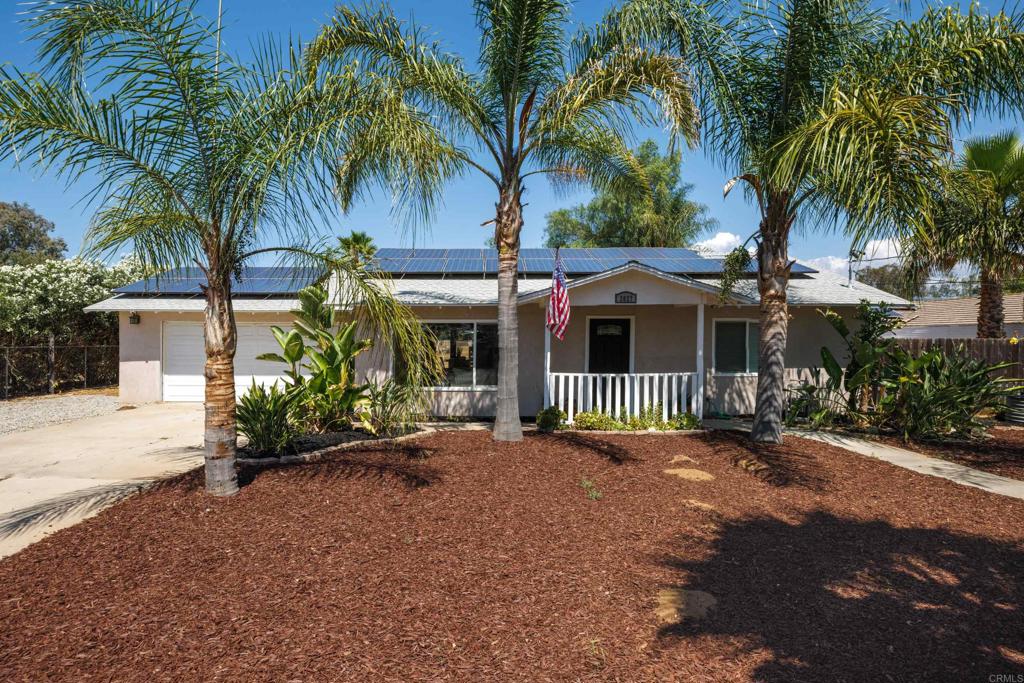 a view of a house with a patio