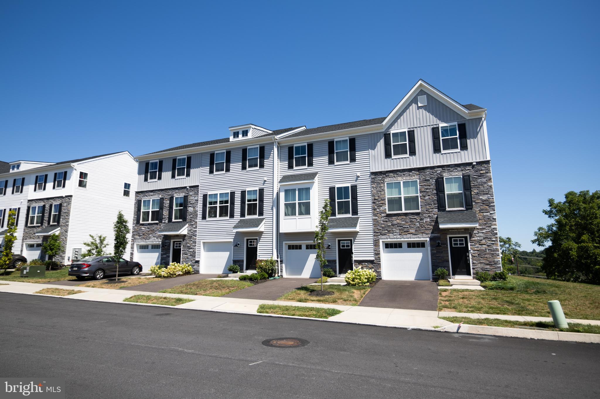 a front view of a building with street view