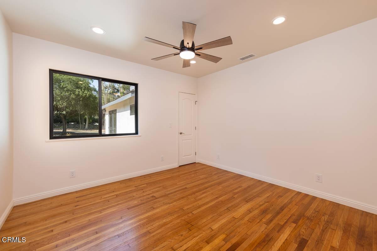 1068 Cuyama Road Ojai, CA 93023 - Photo 15 of 23 a view of empty room with wooden floor
