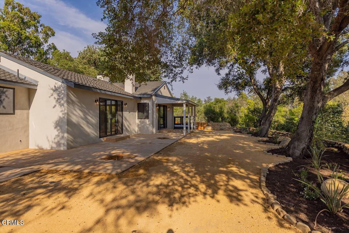 1068 Cuyama Road Ojai, CA 93023 - Photo 17 of 23 a front view of a house with a tree