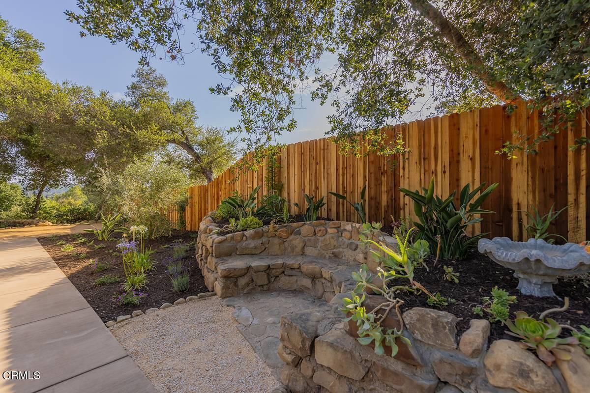1068 Cuyama Road Ojai, CA 93023 - Photo 18 of 23 a view of a backyard with plants and trees