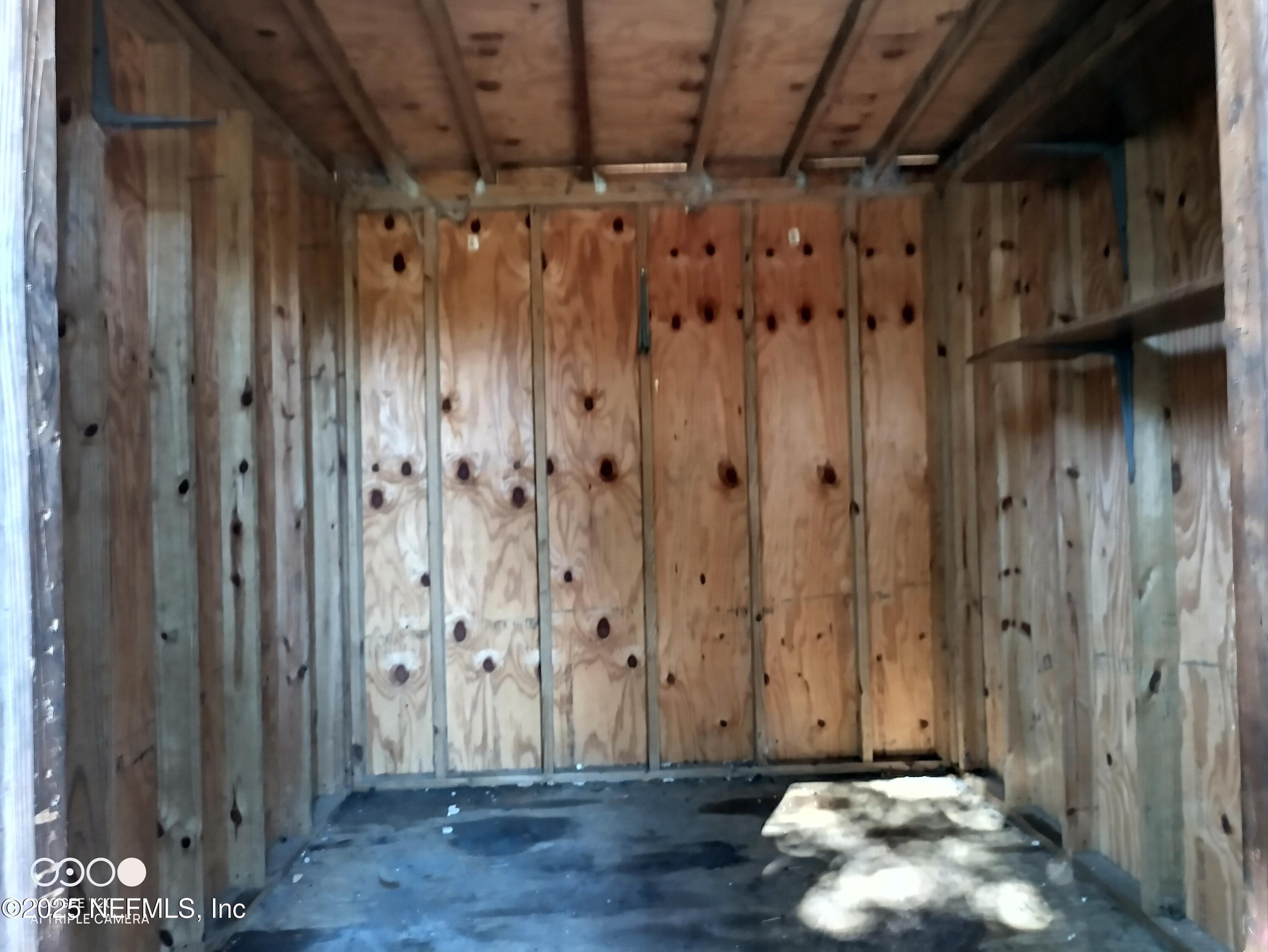 13926 Sanderson Circle Sanderson, FL 32087 - Photo 12 of 12 a view of a wooden door