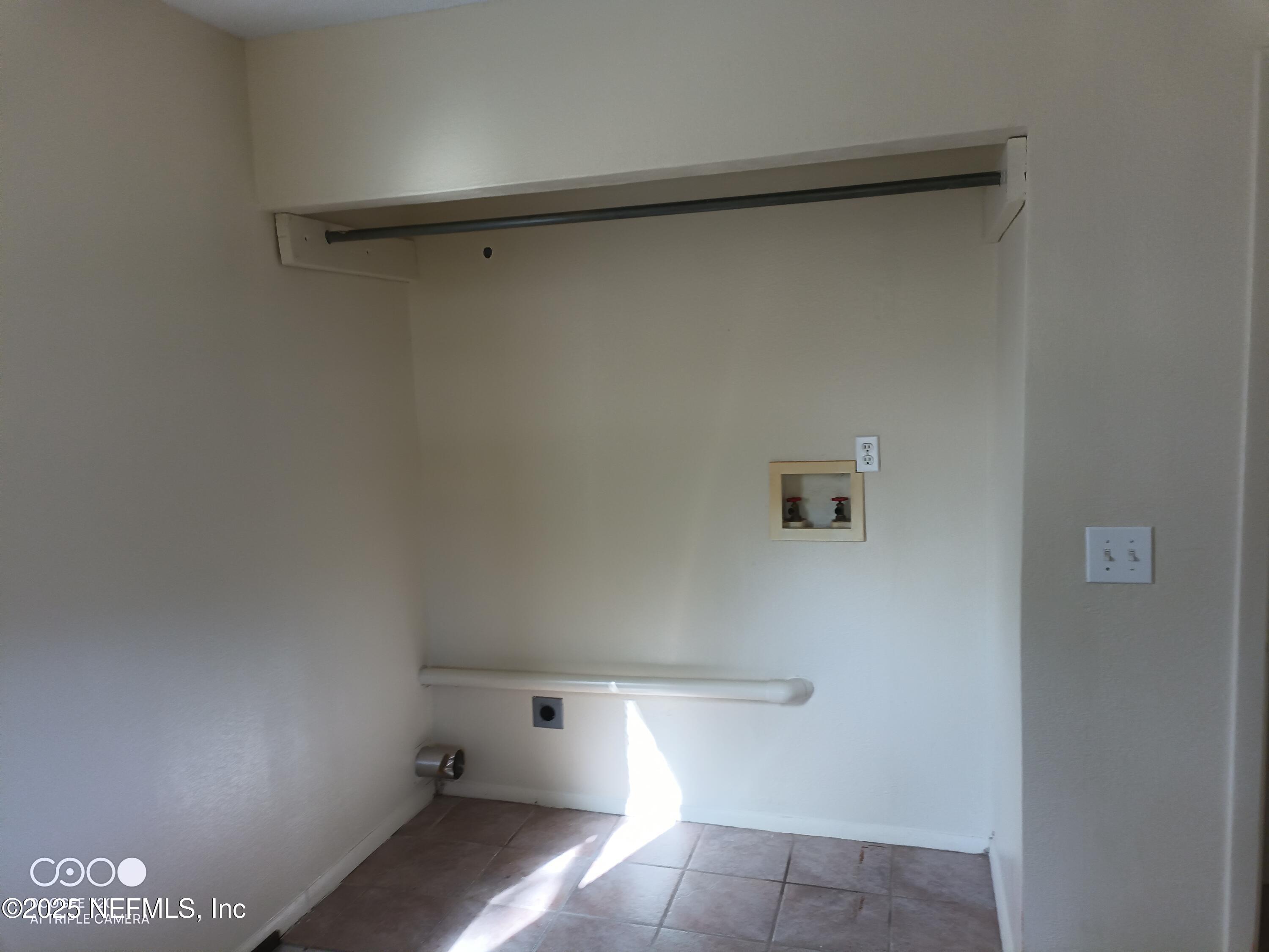 13926 Sanderson Circle Sanderson, FL 32087 - Photo 6 of 12 inside laundry