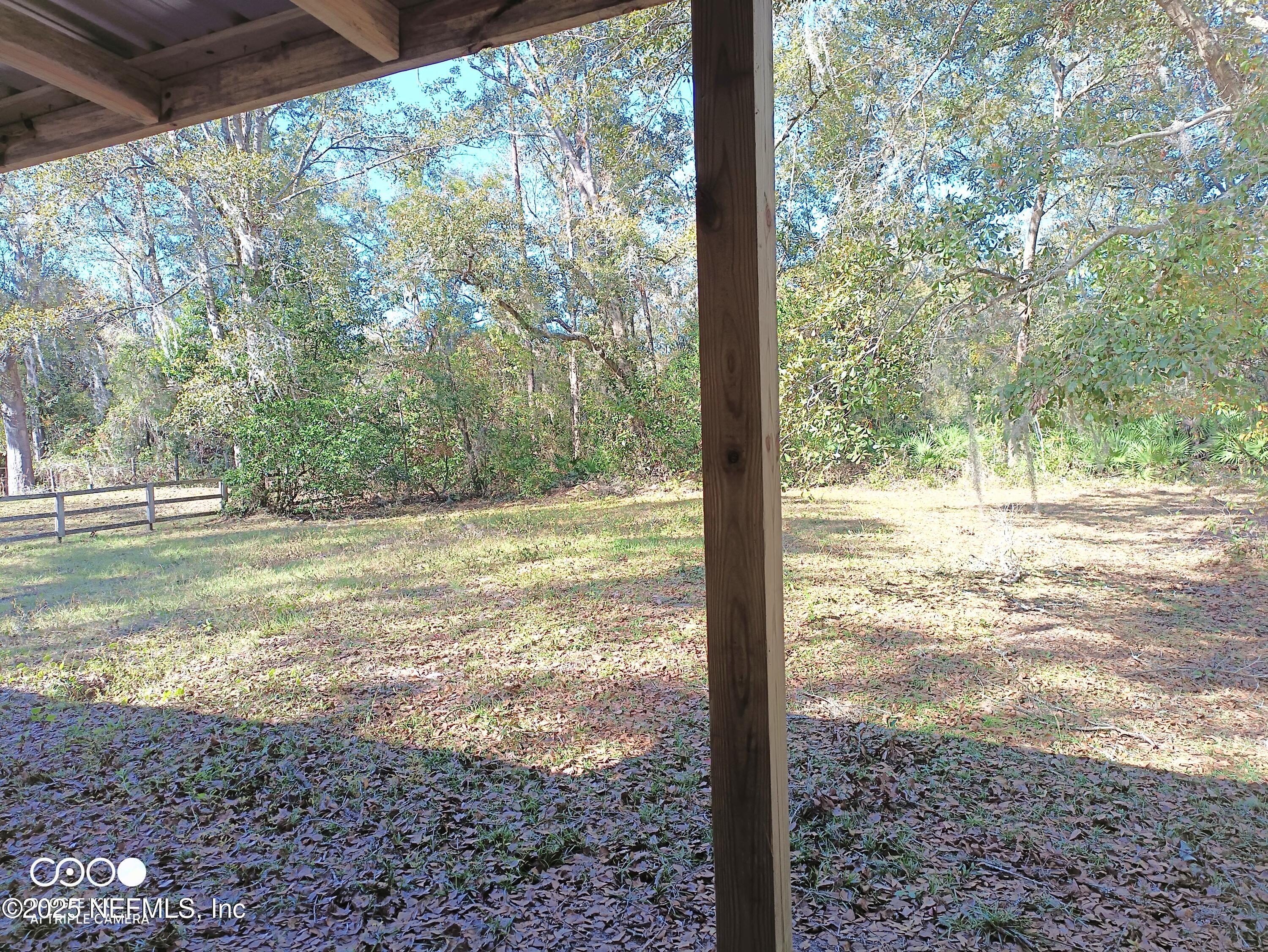 13926 Sanderson Circle Sanderson, FL 32087 - Photo 10 of 12 a view of a yard from a window