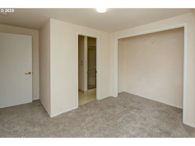 a bathroom with a shower and a toilet