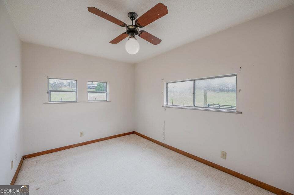 626 Greenbush Road LaFayette, GA 30728 - Photo 22 of 53 a view of room with window and ceiling fan