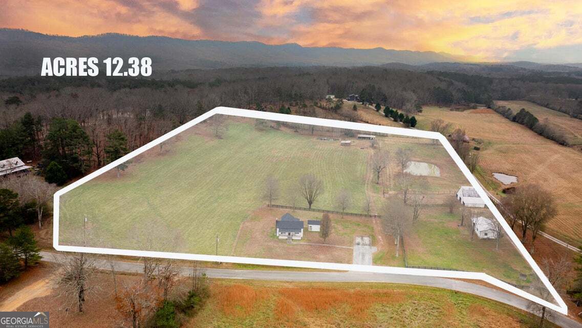 626 Greenbush Road LaFayette, GA 30728 - Photo 45 of 53 a view of a swimming pool with a yard and mountain view