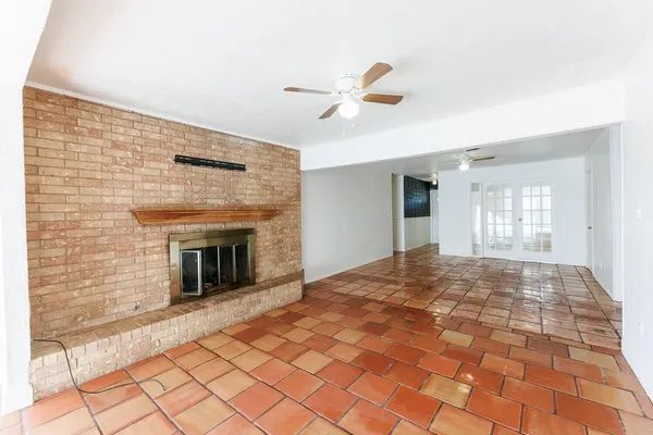 a view of an empty room and window