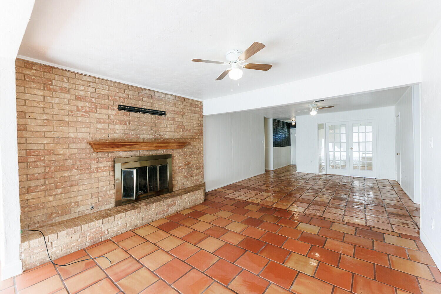 4714 46th Street Lubbock, TX 79414 - Photo 14 of 57 a view of an empty room with window and fire place