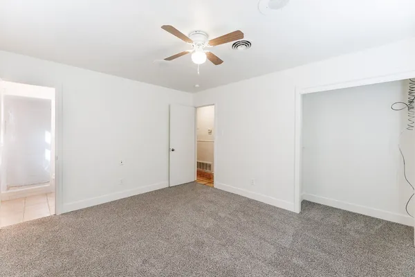 a view of an empty walk in closet