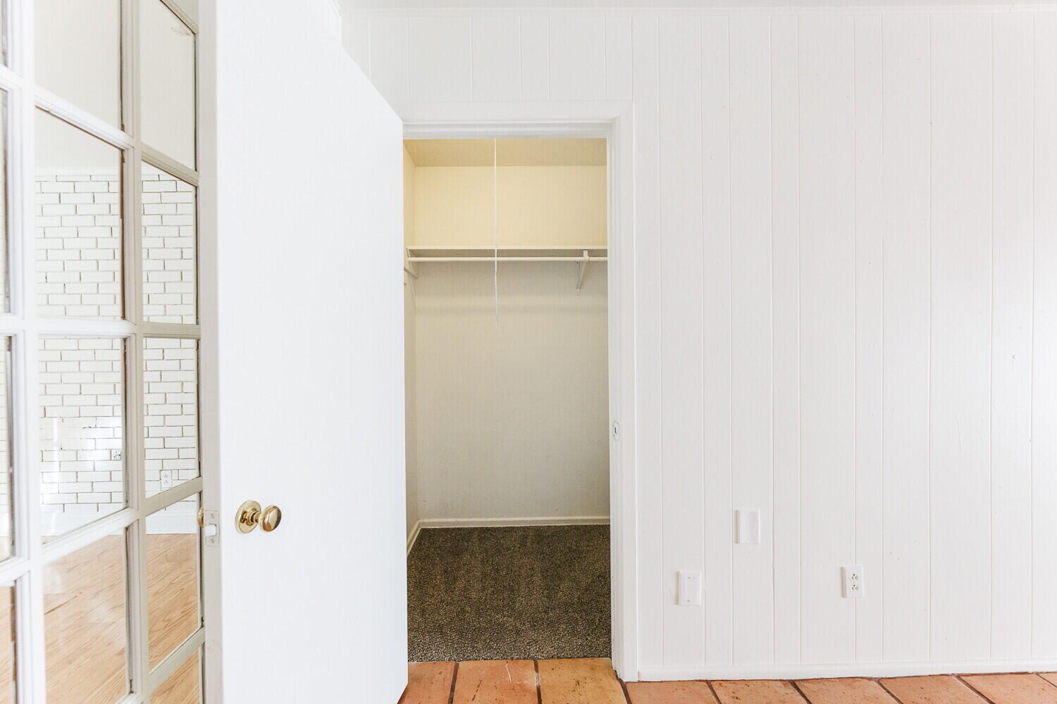 4714 46th Street Lubbock, TX 79414 - Photo 9 of 57 a view of walk in closet with empty racks