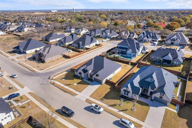 an aerial view of a city with lots of residential buildings