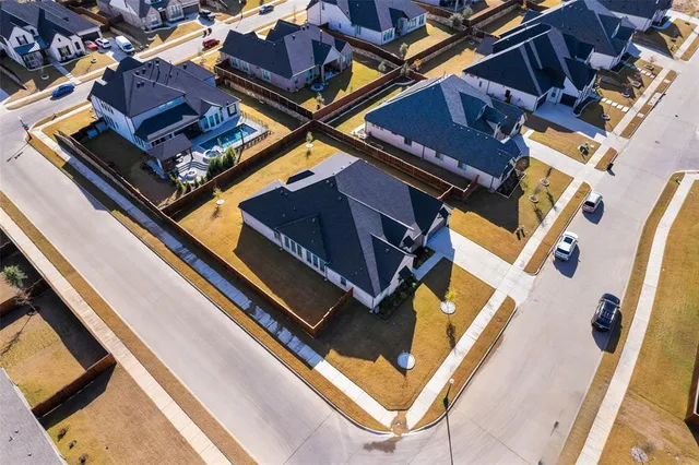an aerial view of a house with roof