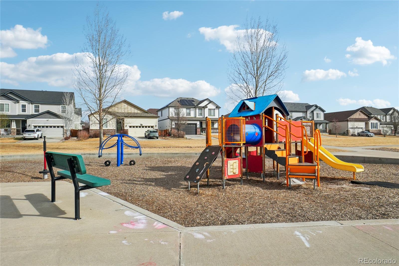 6523 Independence Street Frederick, CO 80516 - Photo 18 of 21 a view of a park with slide