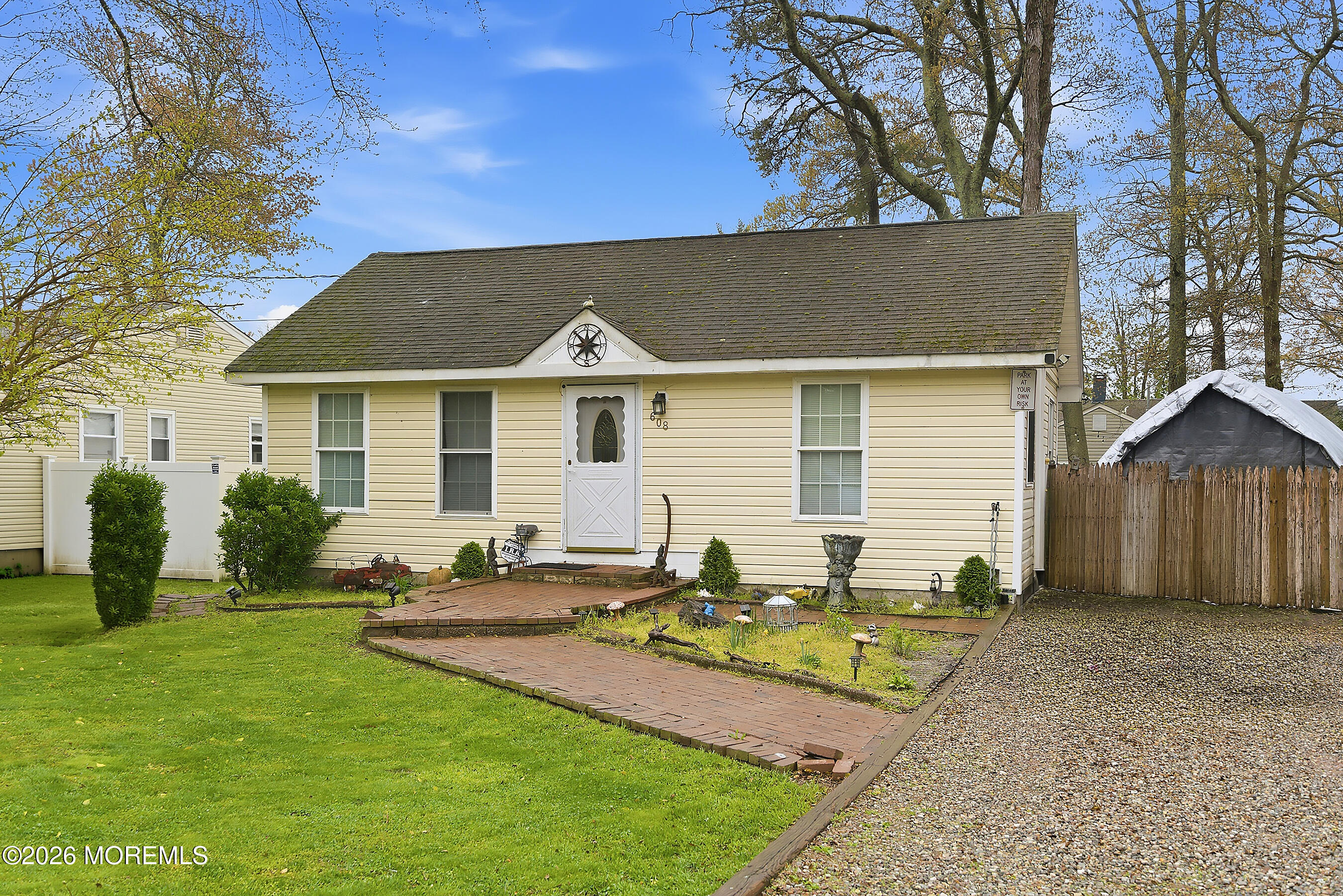 608 Holly Boulevard Bayville, NJ 08721 - Photo 3 of 8 a front view of a house with a yard