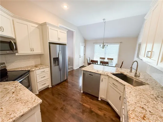 $445,000 | 1517 Johnston Drive, Raymore, MO 64083