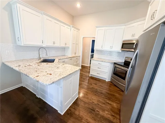 $445,000 | 1517 Johnston Drive, Raymore, MO 64083