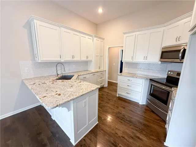 $440,000 | 1517 Johnston Drive, Raymore, MO 64083