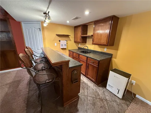 $445,000 | 1517 Johnston Drive, Raymore, MO 64083