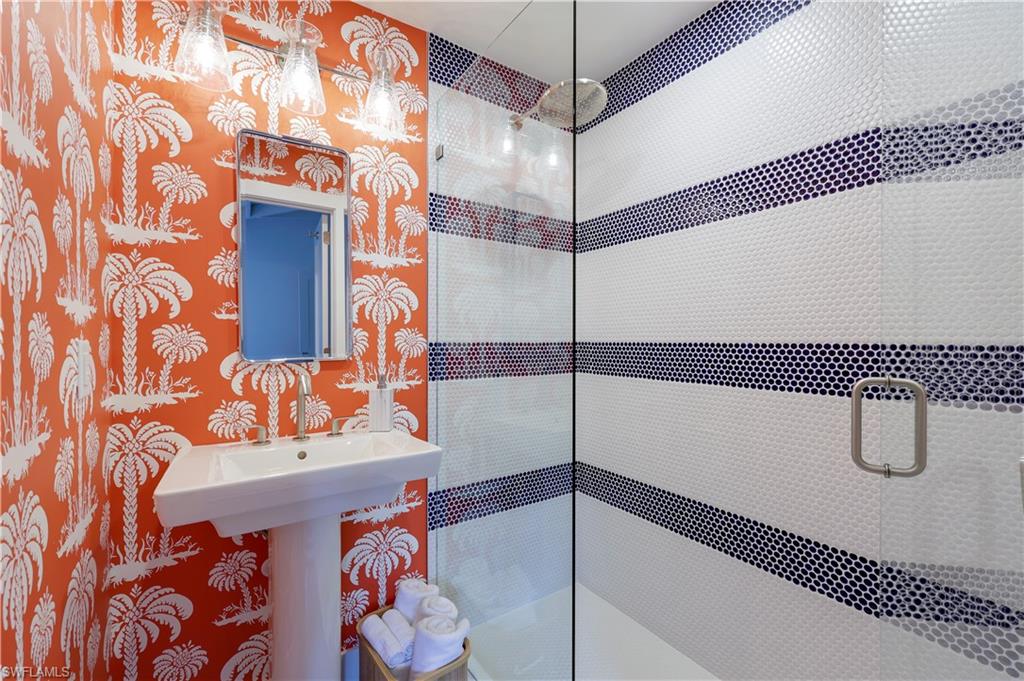 47 8th Avenue South Naples, FL 34102 - Photo 19 of 27 Bathroom with a shower with door