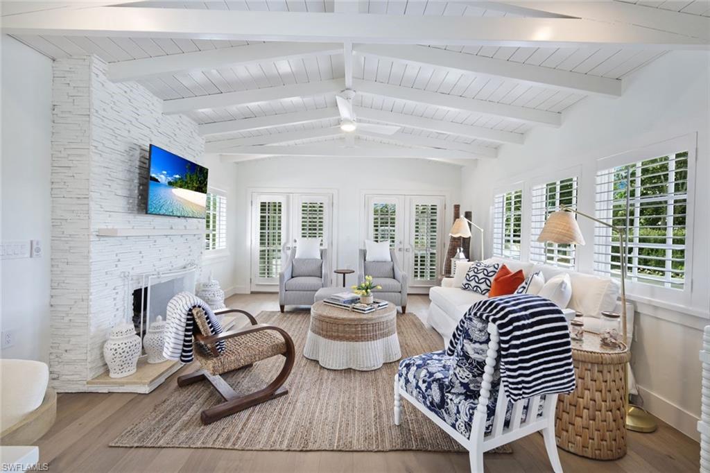 47 8th Avenue South Naples, FL 34102 - Photo 3 of 27 Cozy Living Room with Fireplace