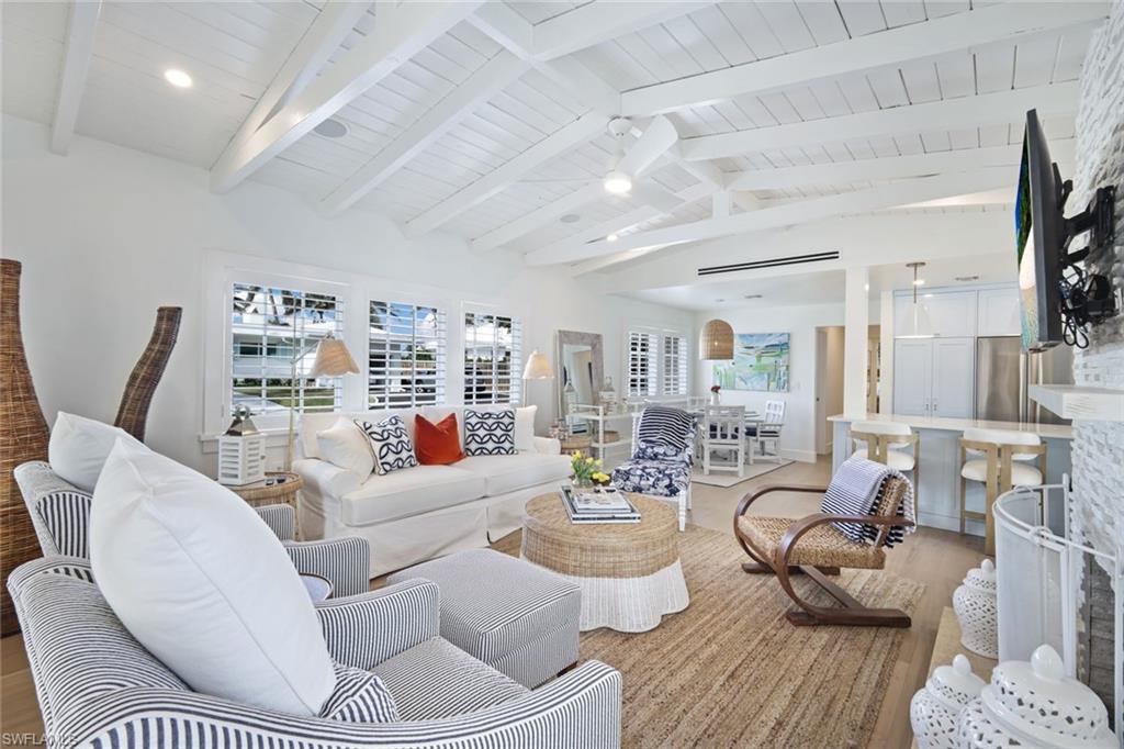 47 8th Avenue South Naples, FL 34102 - Photo 5 of 27 Living Room Open to Dining Areas