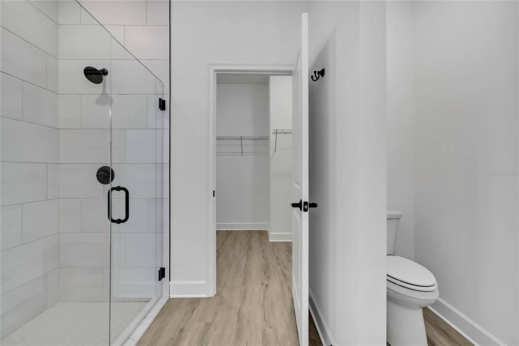 6513 Owl Road Weeki Wachee, FL 34613 - Photo 30 of 47 a bathroom with a shower and a toilet