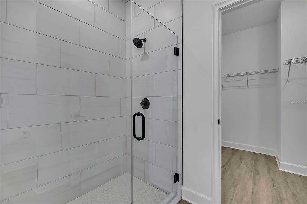 6513 Owl Road Weeki Wachee, FL 34613 - Photo 32 of 47 a bathroom with a shower