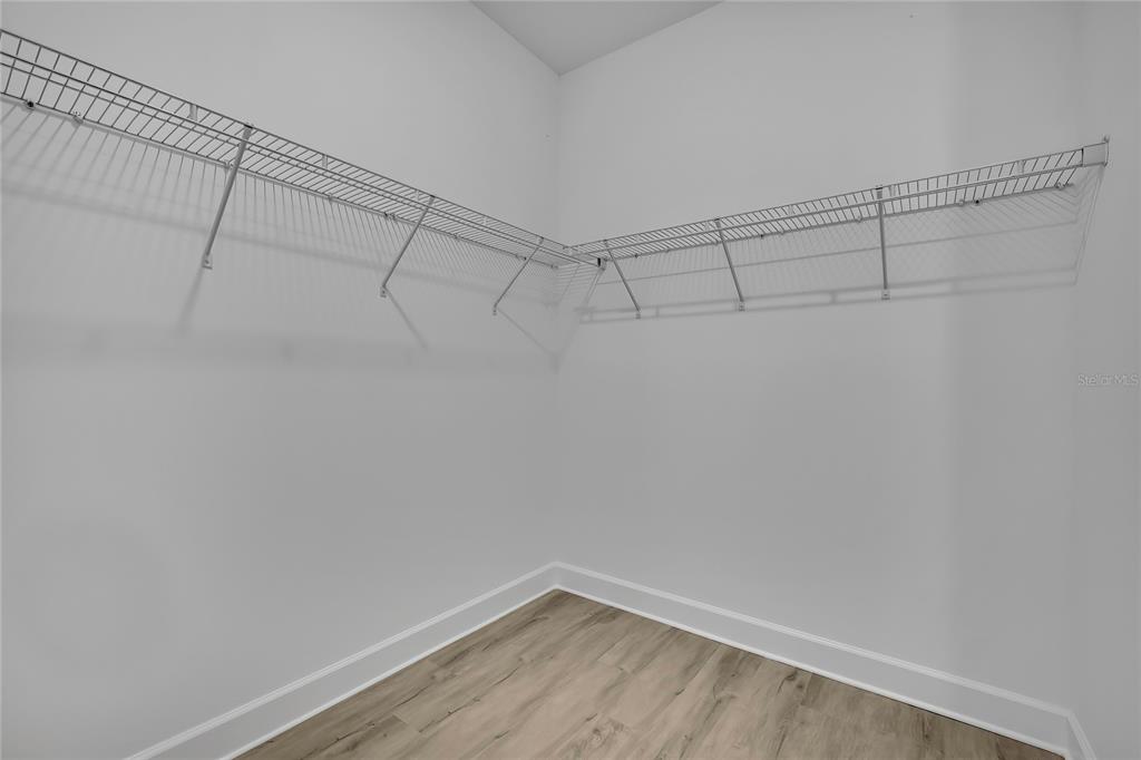 6513 Owl Road Weeki Wachee, FL 34613 - Photo 33 of 47 a view of a room with racks on the wall