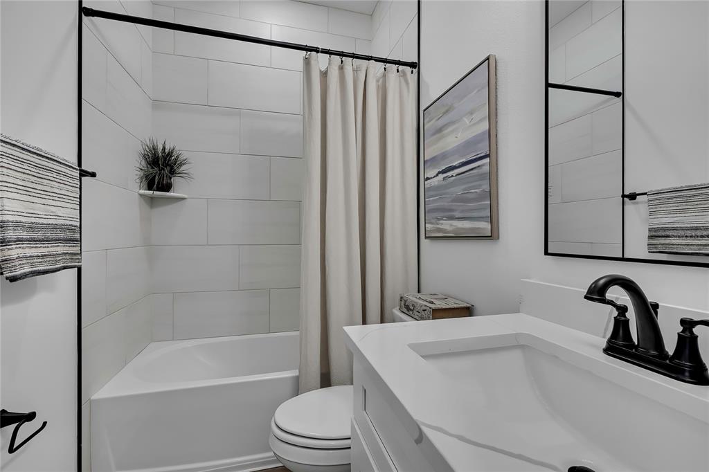 6513 Owl Road Weeki Wachee, FL 34613 - Photo 39 of 47 a bathroom with a sink toilet and shower