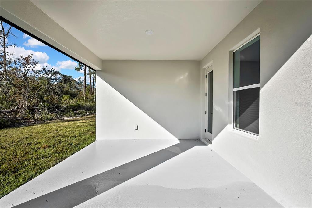 6513 Owl Road Weeki Wachee, FL 34613 - Photo 42 of 47 a view of an outdoor space with a front door